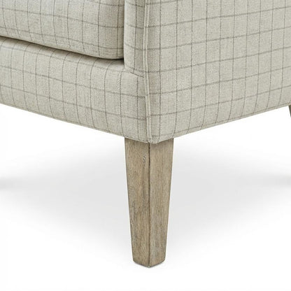 Beige Wing Chair with Stylish Design and Comfortable Upholstery
