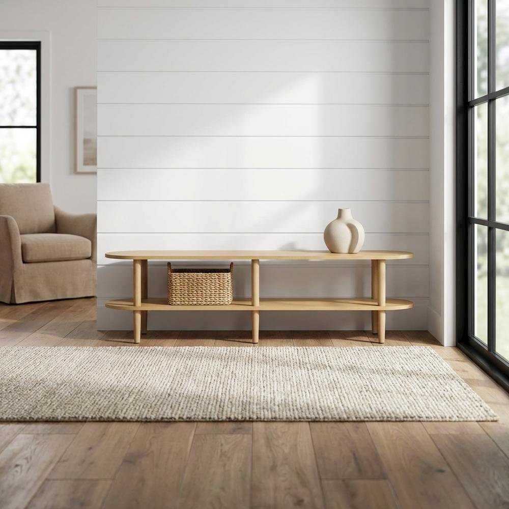Brown wood TV stand with solid mango construction and oval design
