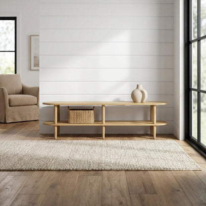 Brown wood TV stand with solid mango construction and oval design