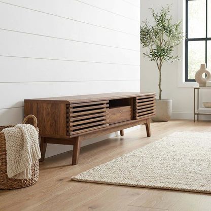 Brown wood TV stand with sleek design and ample storage space