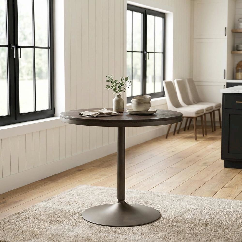 Industrial-style dining table with antique metal frame