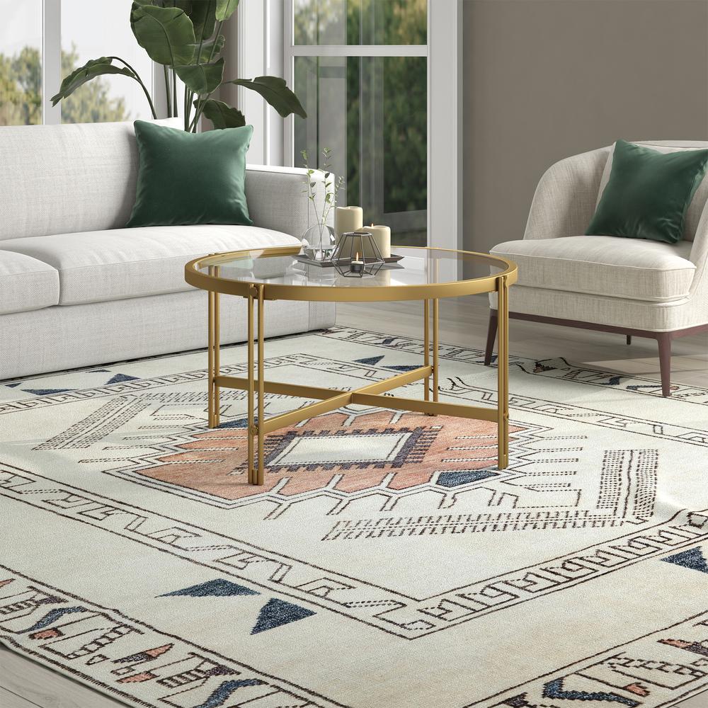 Inez 32" Wide Round Coffee Table in Brass