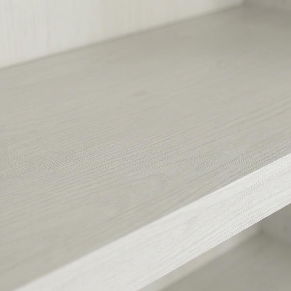 White storage bookcase with spacious shelves and modern design