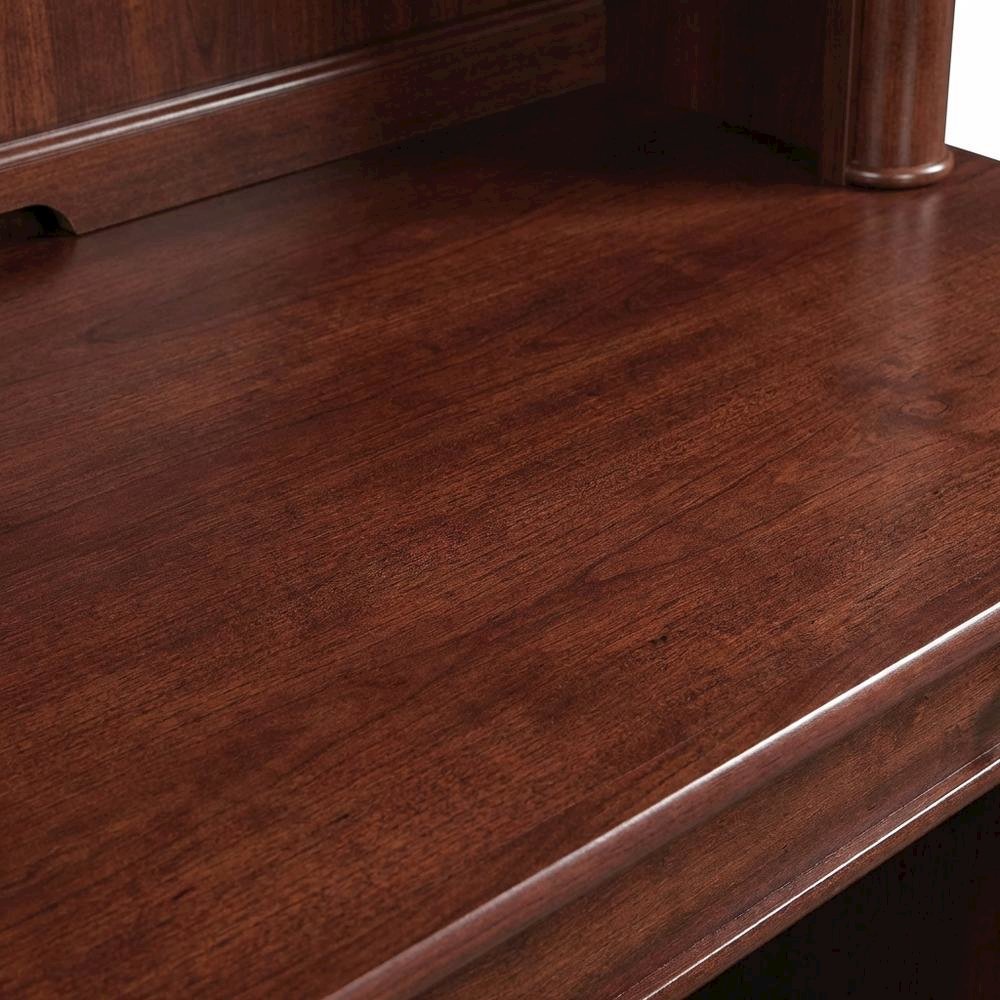 Traditional brown wood desk with hutch and spacious workspace