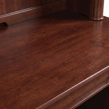 Traditional brown wood desk with hutch and spacious workspace