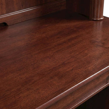 Traditional brown wood desk with hutch and spacious workspace