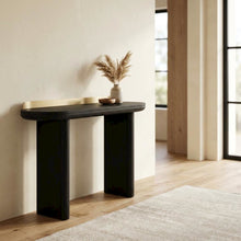 Black minimalist desk with adjustable shelf and sleek leg design