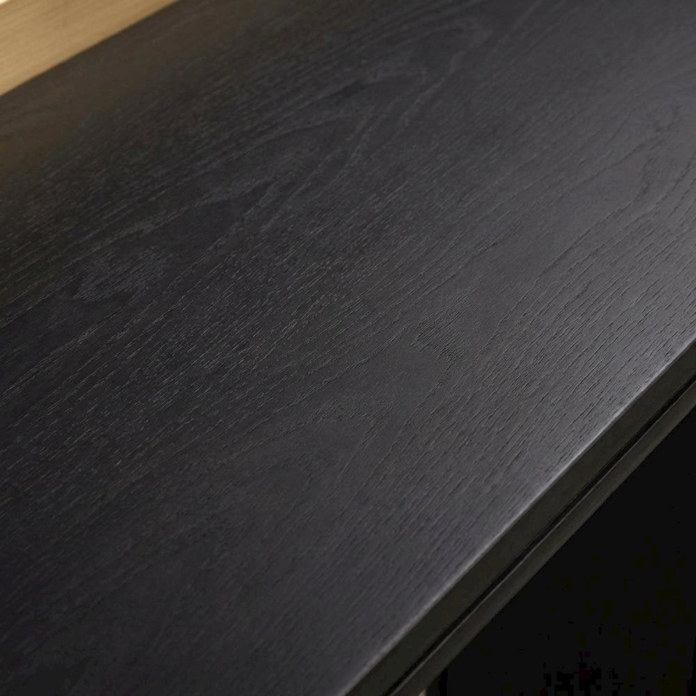 Black minimalist desk with adjustable shelf and sleek leg design