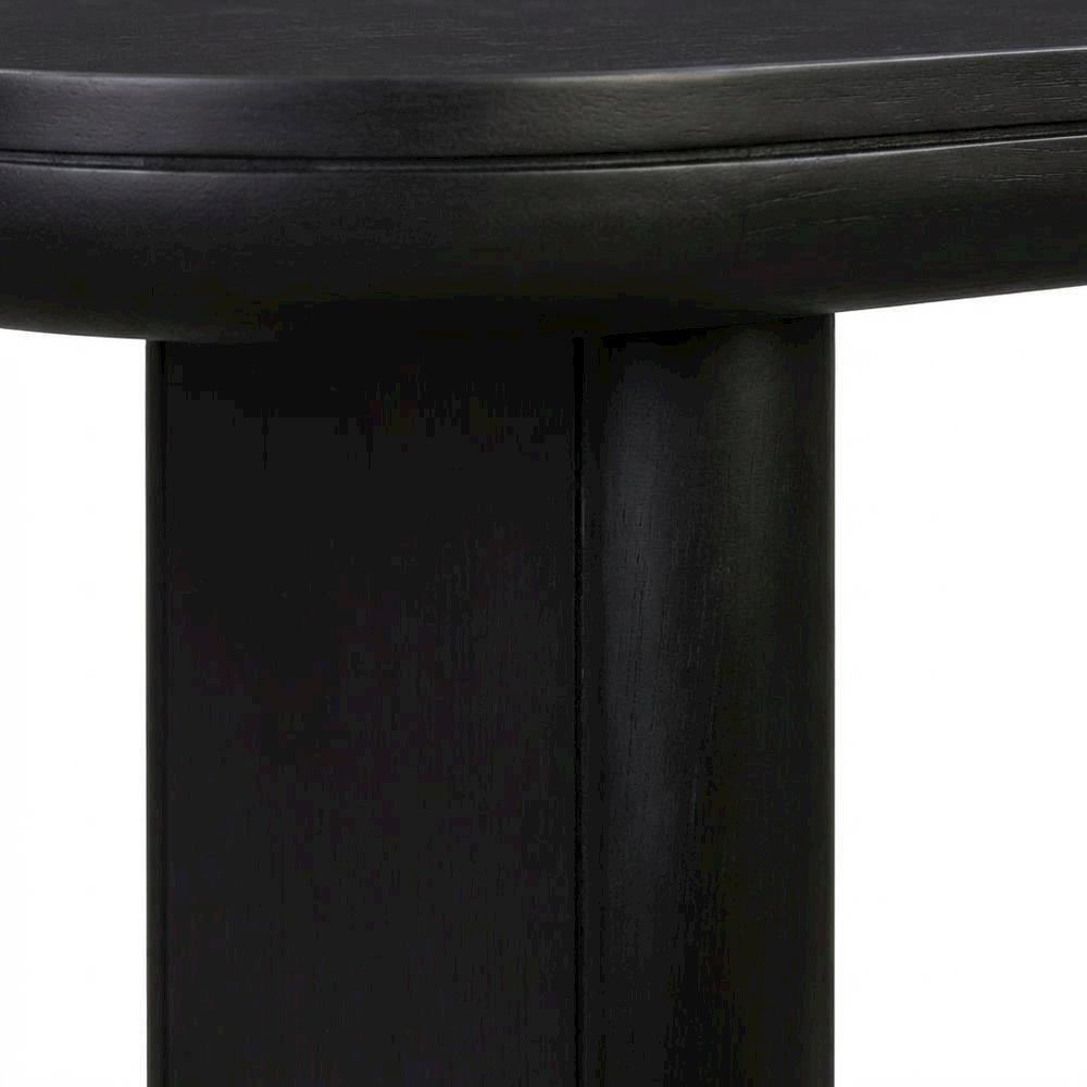 Black minimalist desk with adjustable shelf and sleek leg design