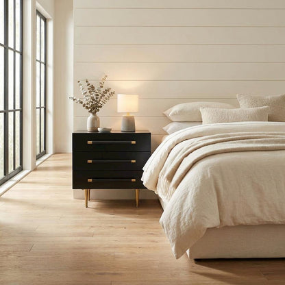 Modern black nightstand with soft-close drawers and gold iron legs