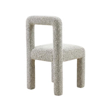 Gray boucle fabric dining chair with fiber-wrapped foam seat and plywood support