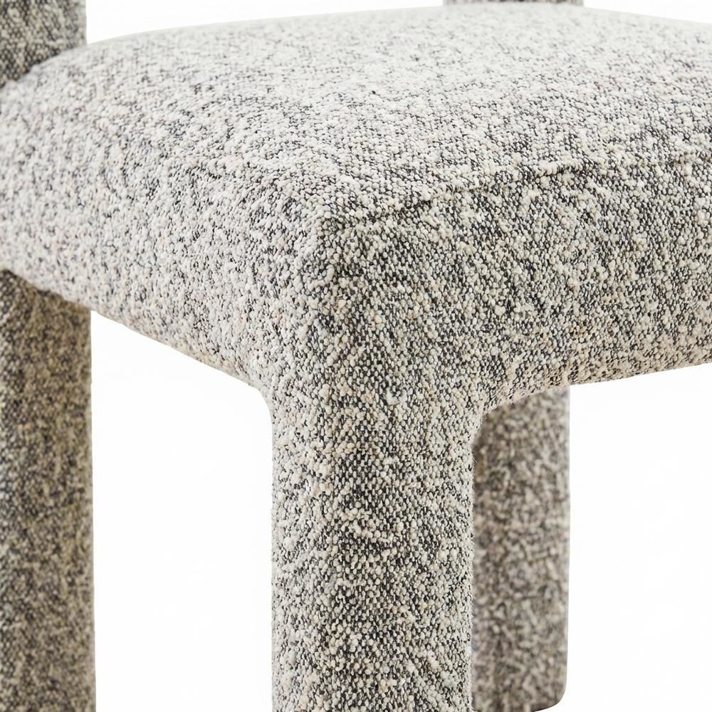 Gray boucle fabric dining chair with fiber-wrapped foam seat and plywood support