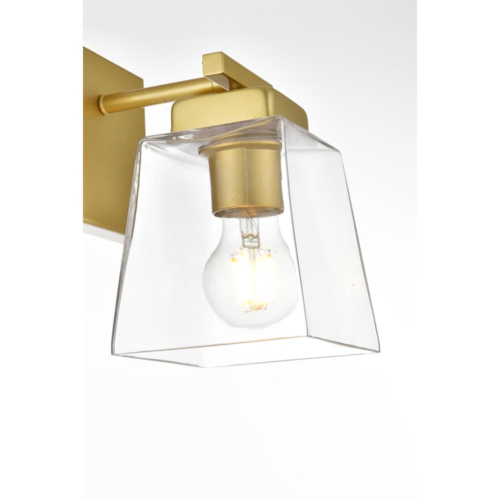 Merrick 1 light Brass and Clear Bath Sconce