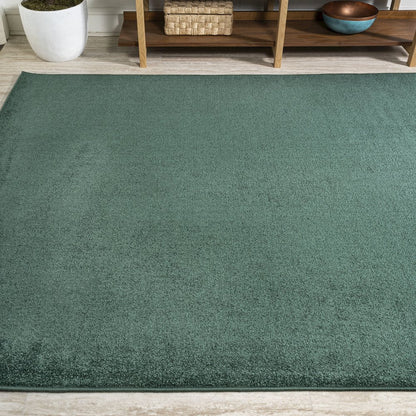 Haze Solid Low Pile Area Rug Emerald
