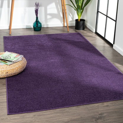Haze Solid Low Pile Area Rug Purple