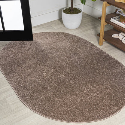 Haze Solid Low Pile Area Rug Brown