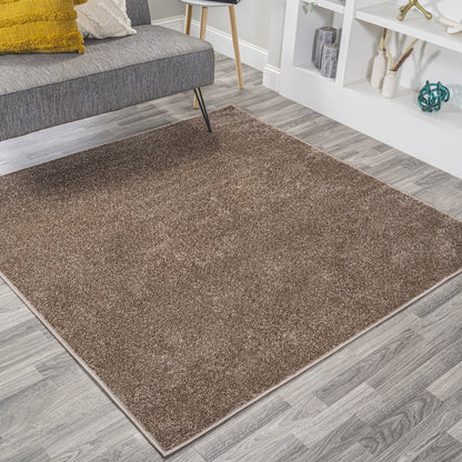 Haze Solid Low Pile Area Rug Brown