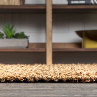 Pata Hand Woven Chunky Jute With Fringe Area Rug