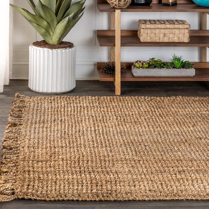 Pata Hand Woven Chunky Jute With Fringe Area Rug