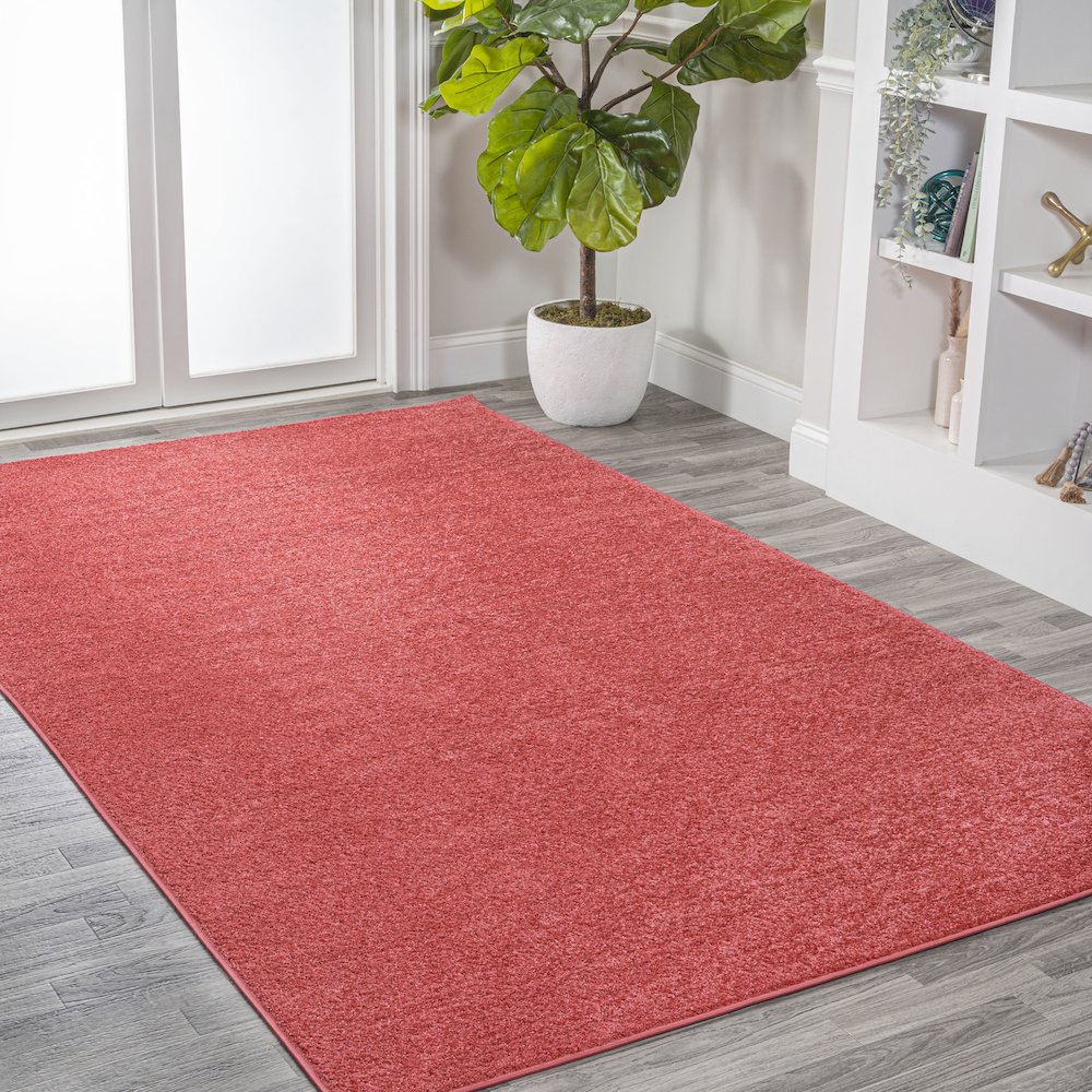 Haze Solid Low Pile Area Rug Red
