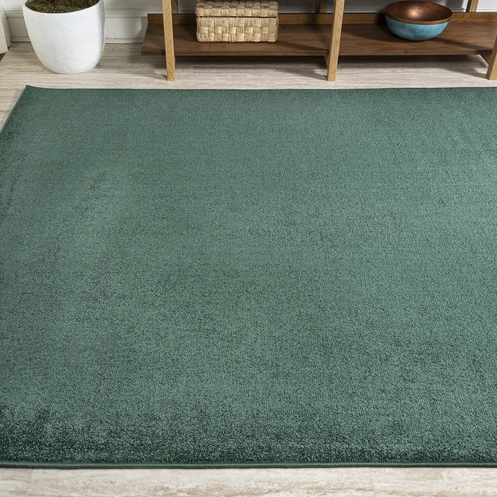 Haze Solid Low Pile Area Rug Emerald