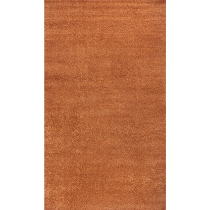 Haze Solid Low Pile Area Rug Orange