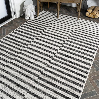 Sukie Modern Offset Stripe Indoor/Outdoor Area Rug