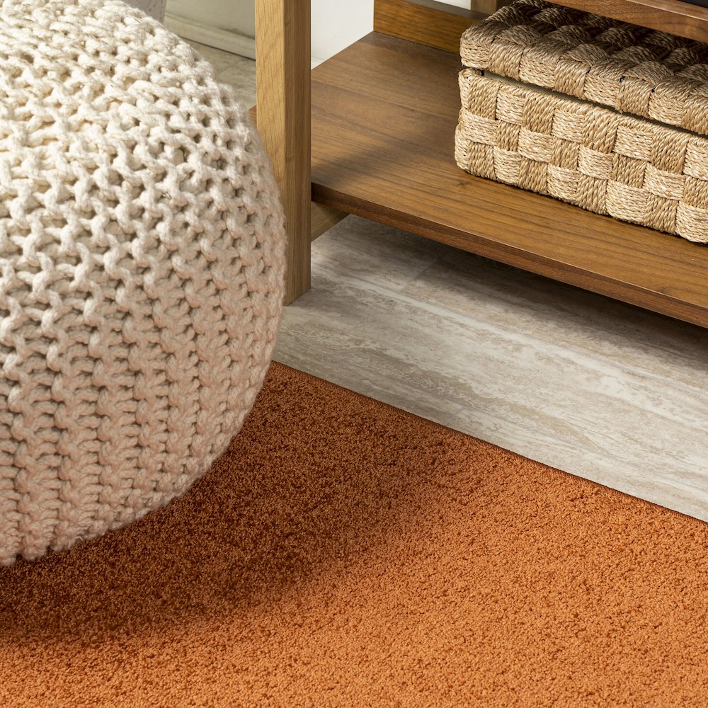 Haze Solid Low Pile Area Rug Orange