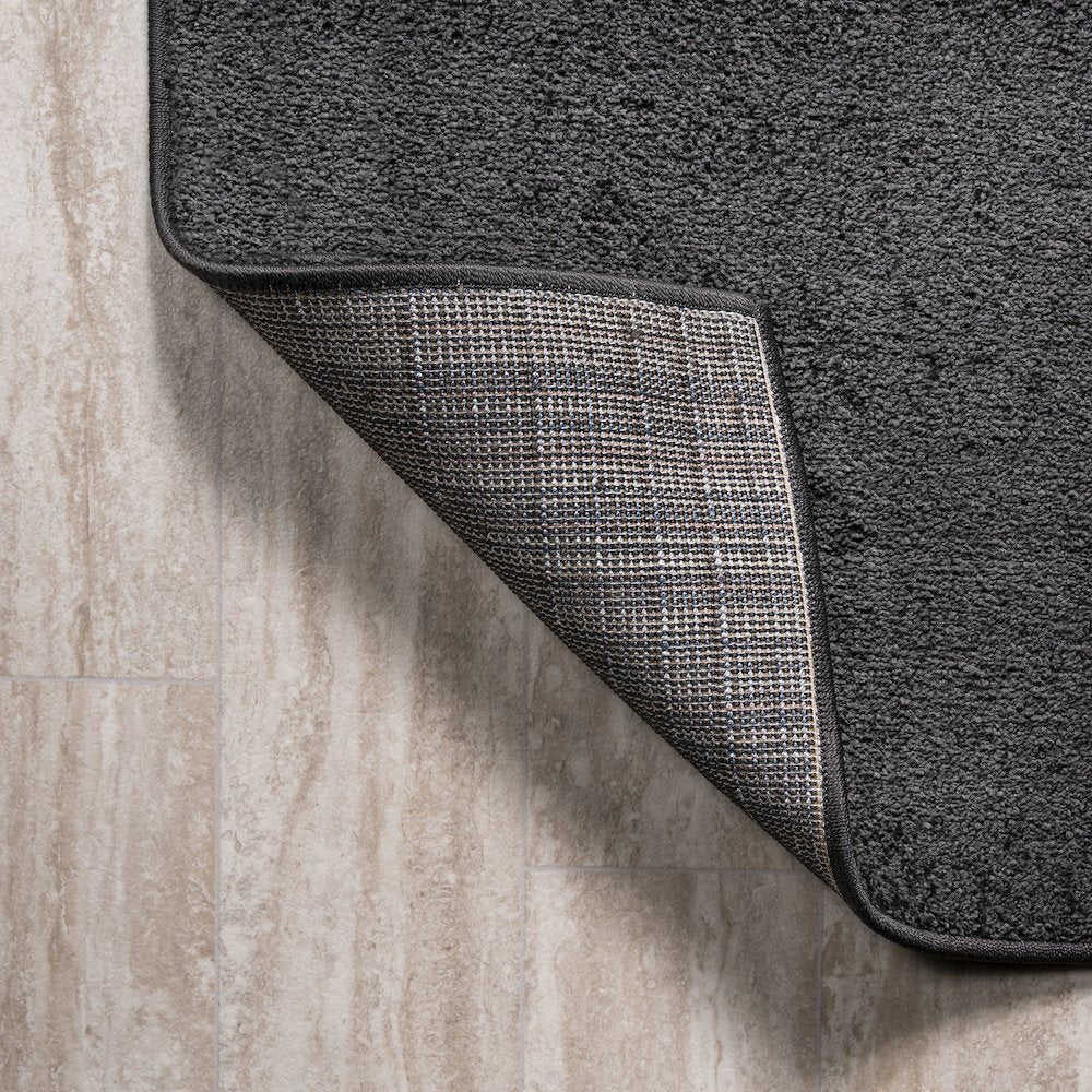 Haze Solid Low Pile Area Rug Black