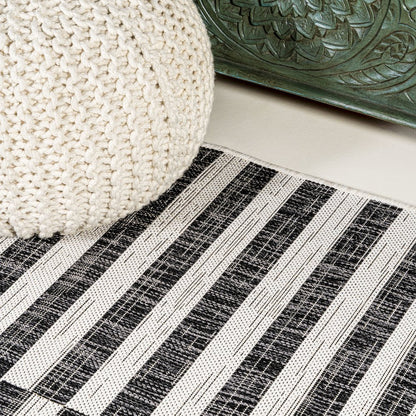 Sukie Modern Offset Stripe Indoor/Outdoor Area Rug