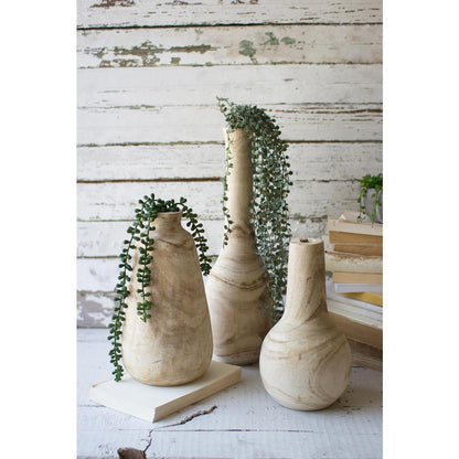 Set Of Three Hand-Carved Tall Wooden Bottles