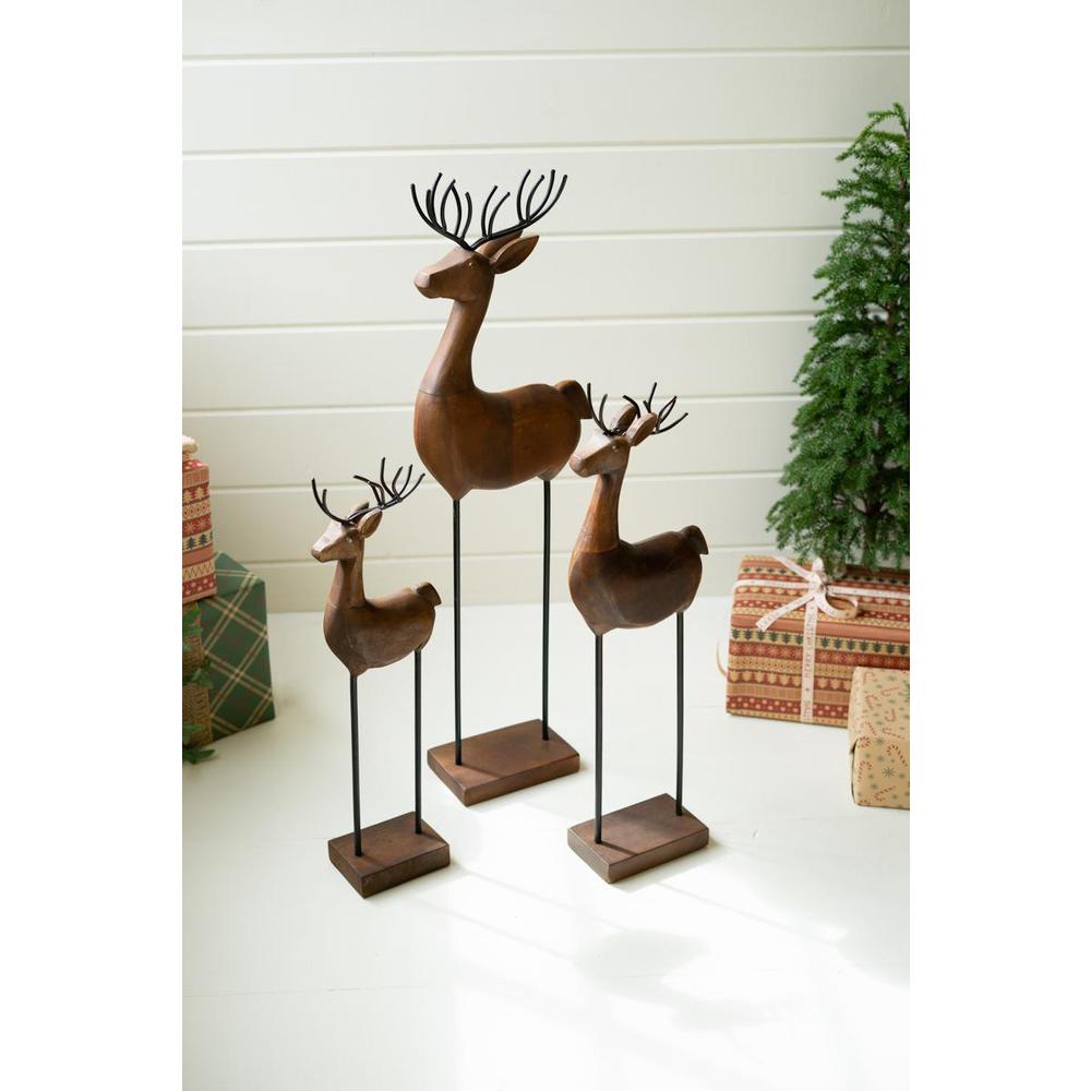 Set Of Three Carved Wood And Iron Reindeer On Bases