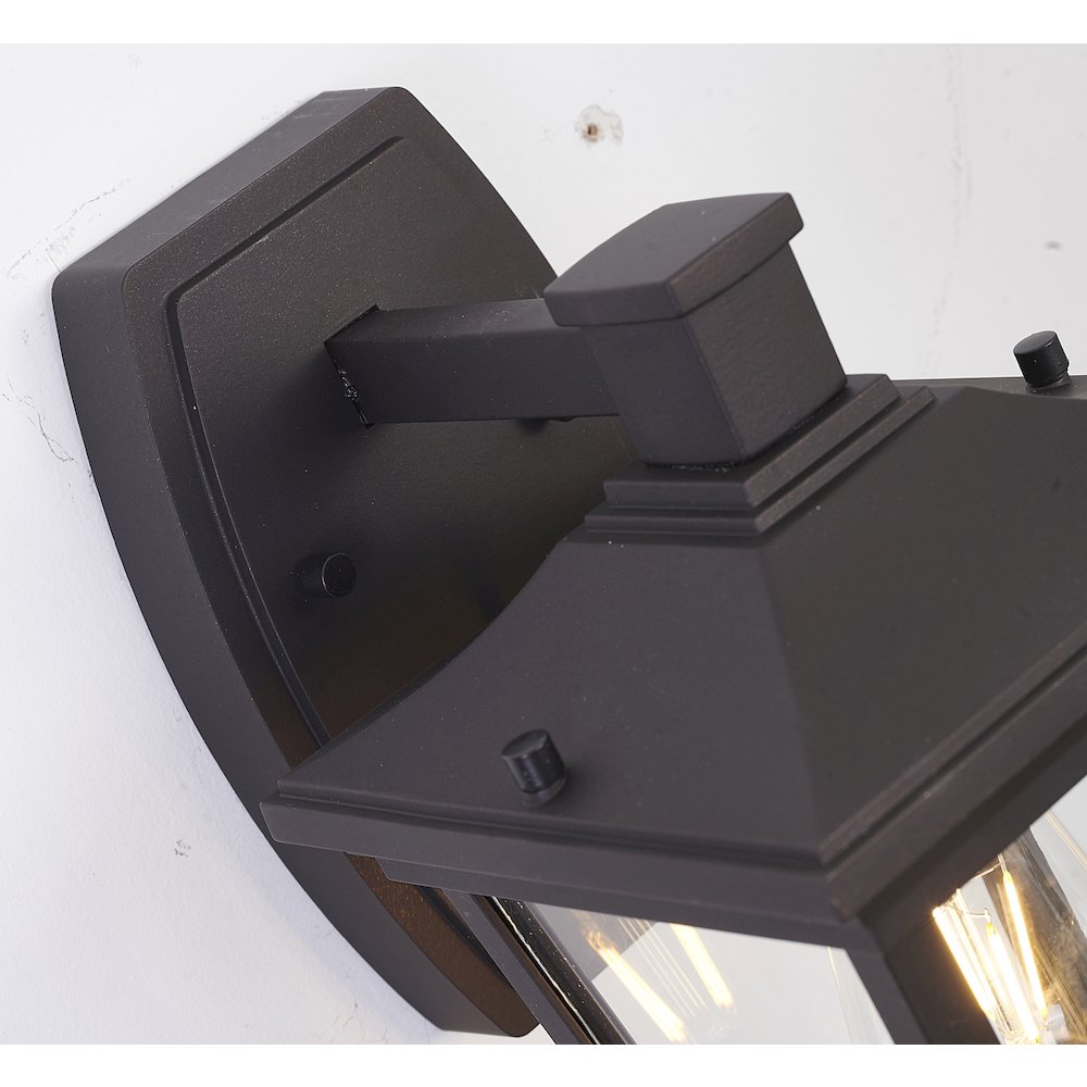1-Light Bronze Metal Outdoor Wall Sconce With A Clear Glass Shade