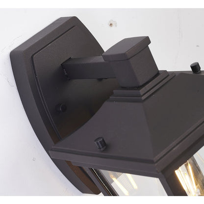 1-Light Bronze Metal Outdoor Wall Sconce With A Clear Glass Shade