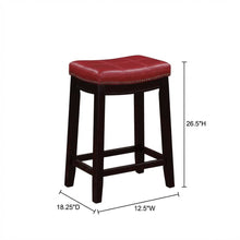 Red counter stool with rubberwood frame and cushioned faux leather seat