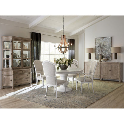 Higgins Street Round Dining Table with an Urn Shaped Pedestal Base