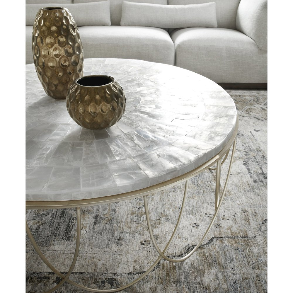 Round Stone Top Cocktail Table with Decorative Metal Base