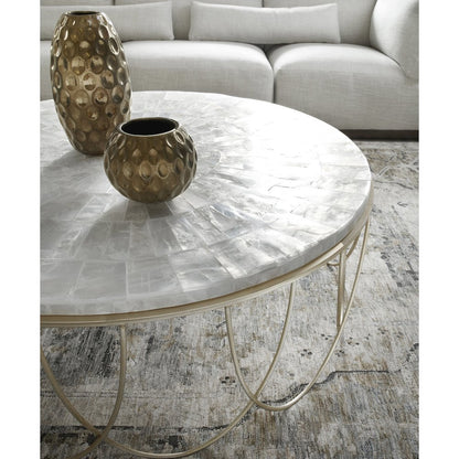 Round Stone Top Cocktail Table with Decorative Metal Base