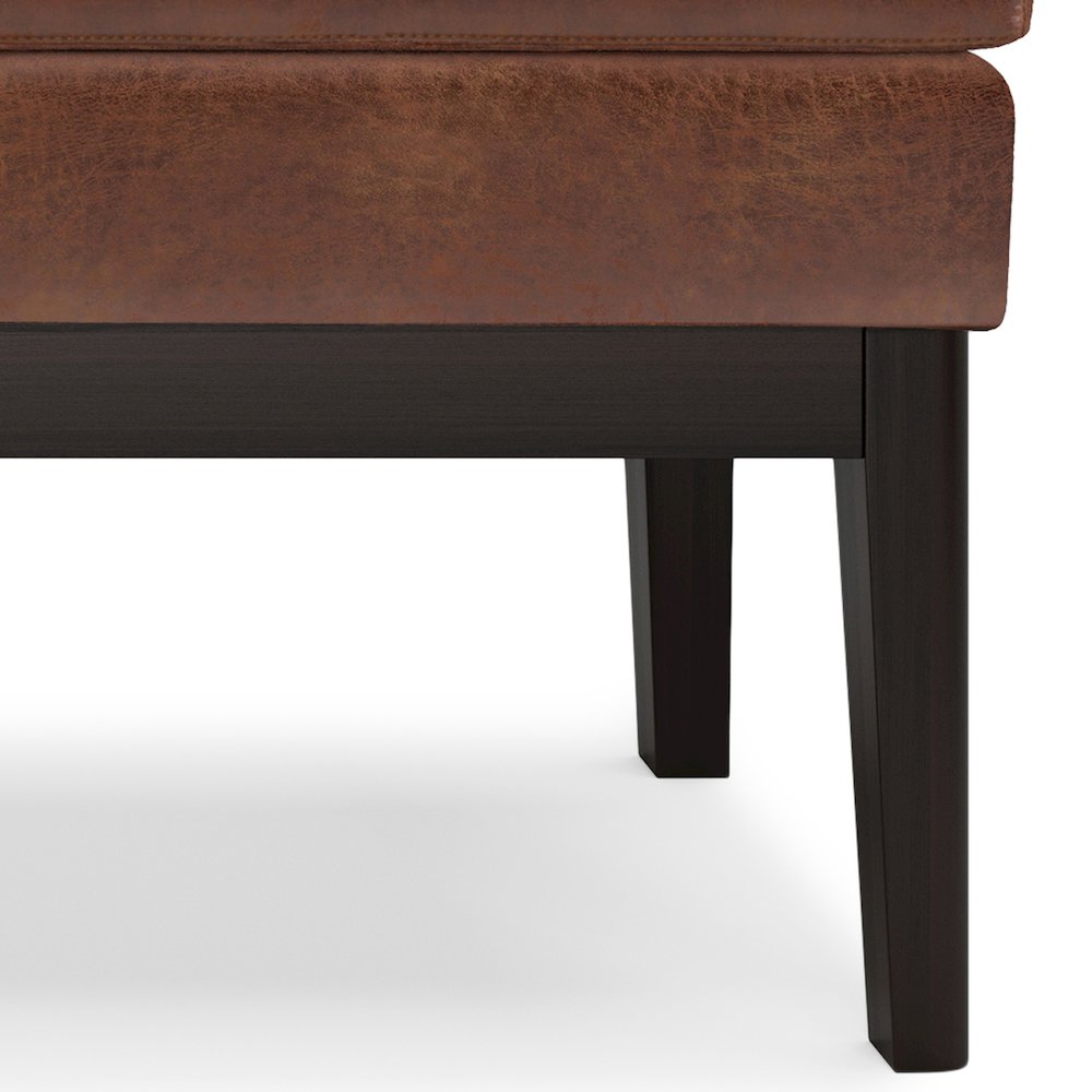 Carlson Ottoman Bench In Distressed Saddle Brown Faux Leather