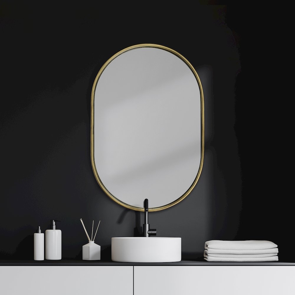 Sylvia I 24L x 35H Oval Gold Metal Frame Wall Mirror