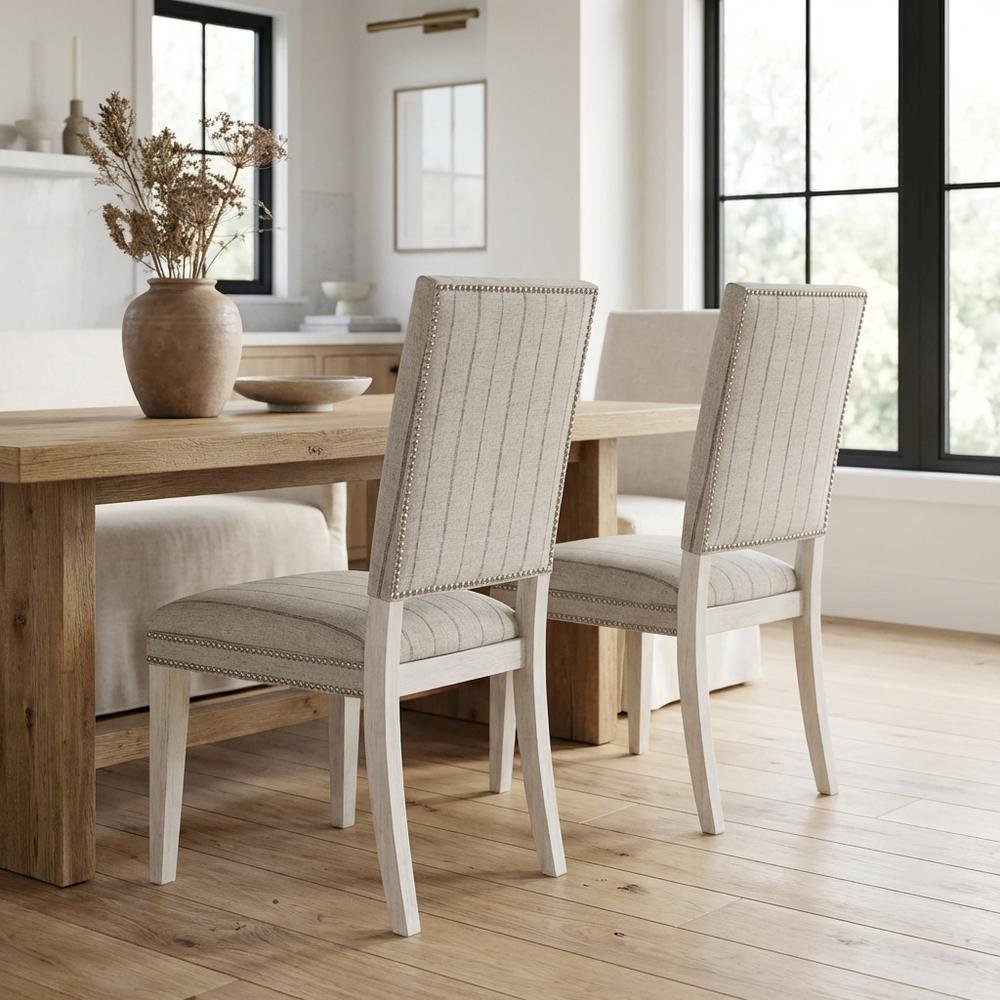 Sandbar-colored dining chair pair with distressed finish and stylish design