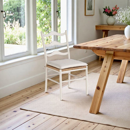 White Wooden Dining Chairs with Rattan Seat and Linen Upholstery