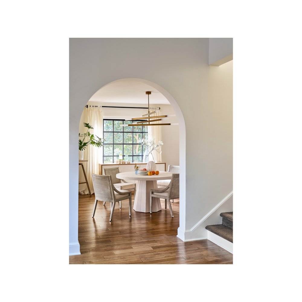 Mackinaw Round Dining Table In White Sand Color