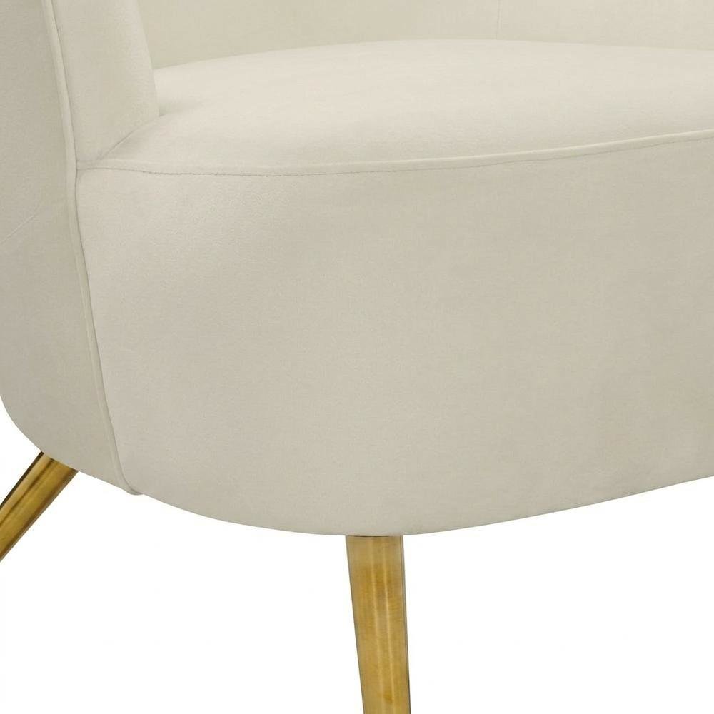 Cream Wingback Armchair with Padded Upholstery and Stylish Design